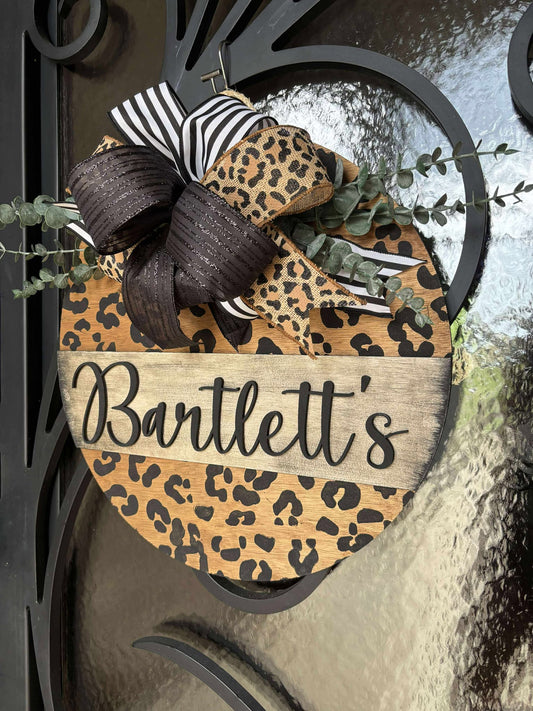 Black Leopard Last Name Door Hanger with Bow